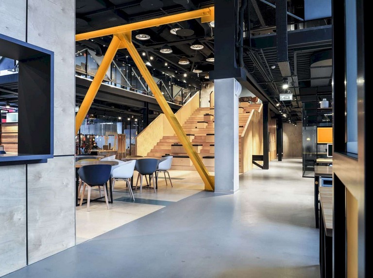 10 Clever  First Project of Co-Working Spaces with Industrial Interior and United Space